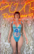 Teal patterned rave bodysuit with lace-up front cutouts