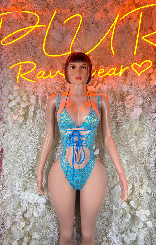 Teal patterned rave bodysuit with lace-up front cutouts