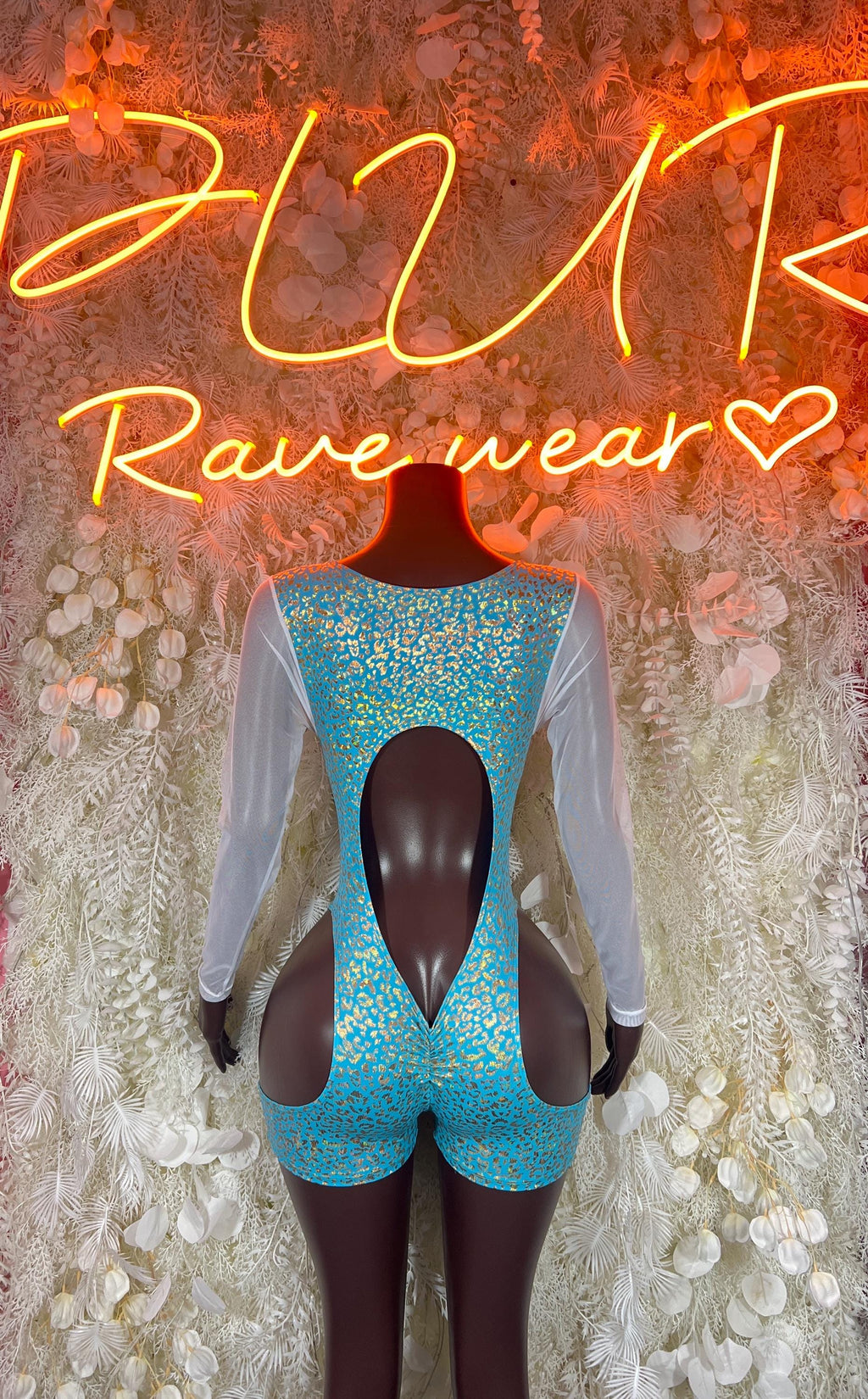 Teal cheetah-print bodysuit with crisscross front lace-up and long sheer sleeves