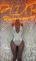 Gold and white cheetah print bodysuit with deep V neckline and cheeky coverage