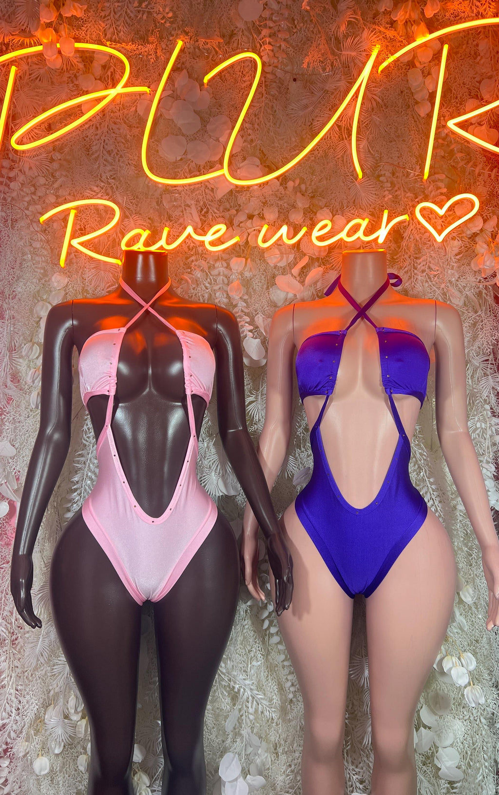 Purple rave bodysuit with halter neckline and thong bottom, open back
