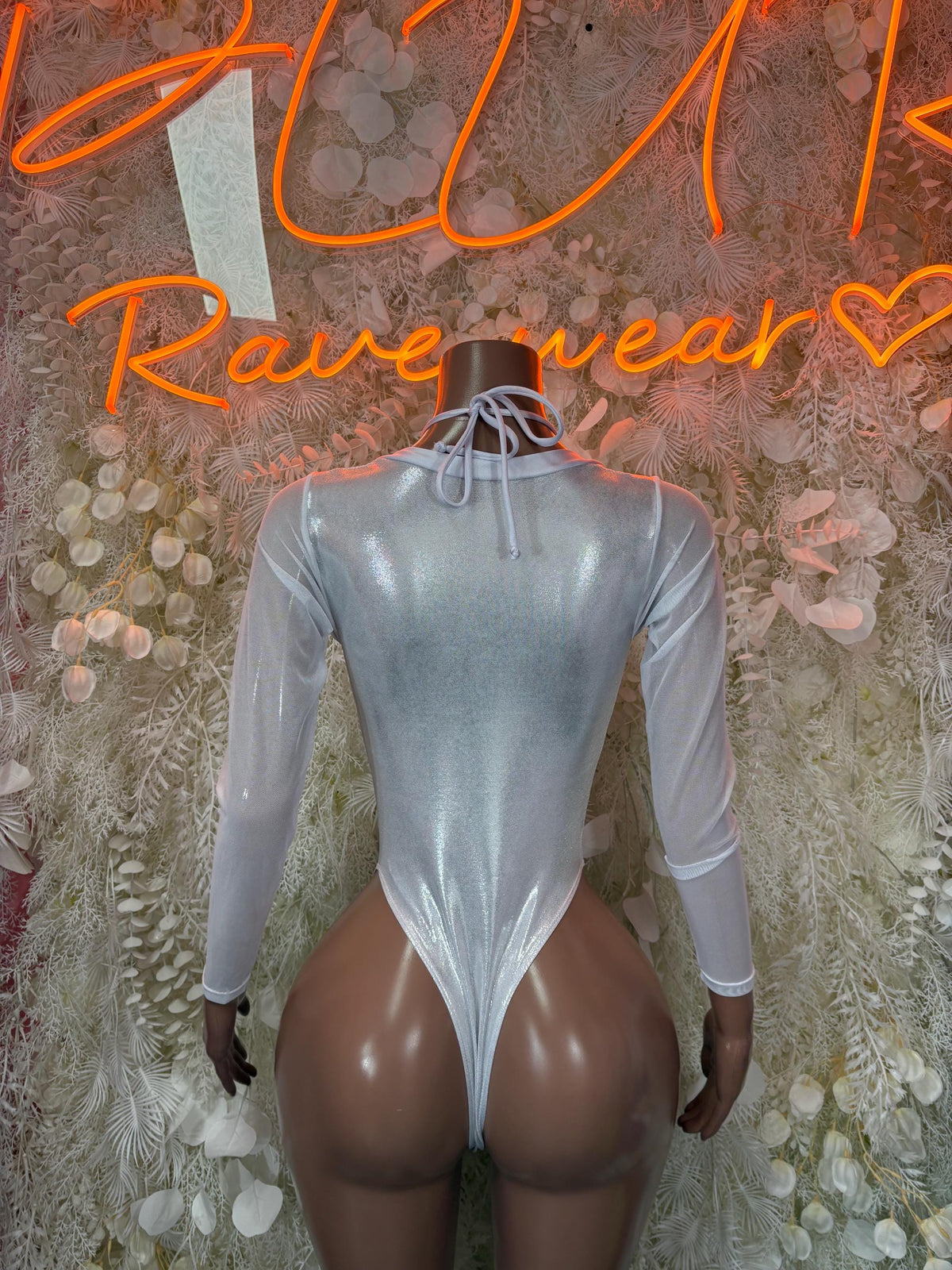 Silver metallic long-sleeve bodysuit with open back and V-shaped front