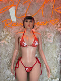 Red sequin triangle bikini with string tie sides, holiday-style costume