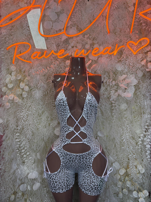Silver cheetah-print bodysuit with lace-up front and long sleeves