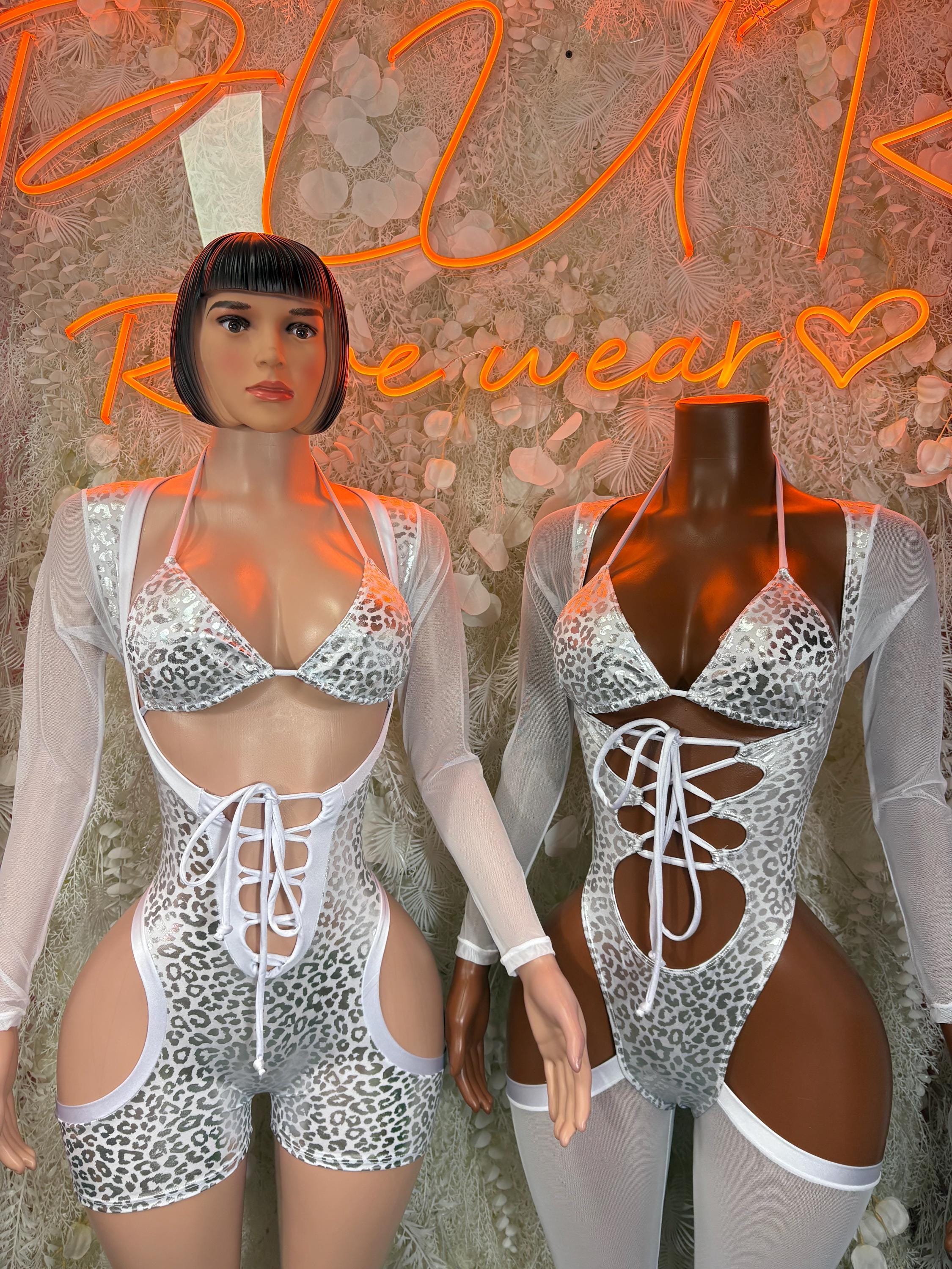 Silver cheetah-print lace-up bodysuit with long sleeves and short-cut bottoms