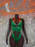 Green lace-up halter bodysuit with red-and-white striped neckline