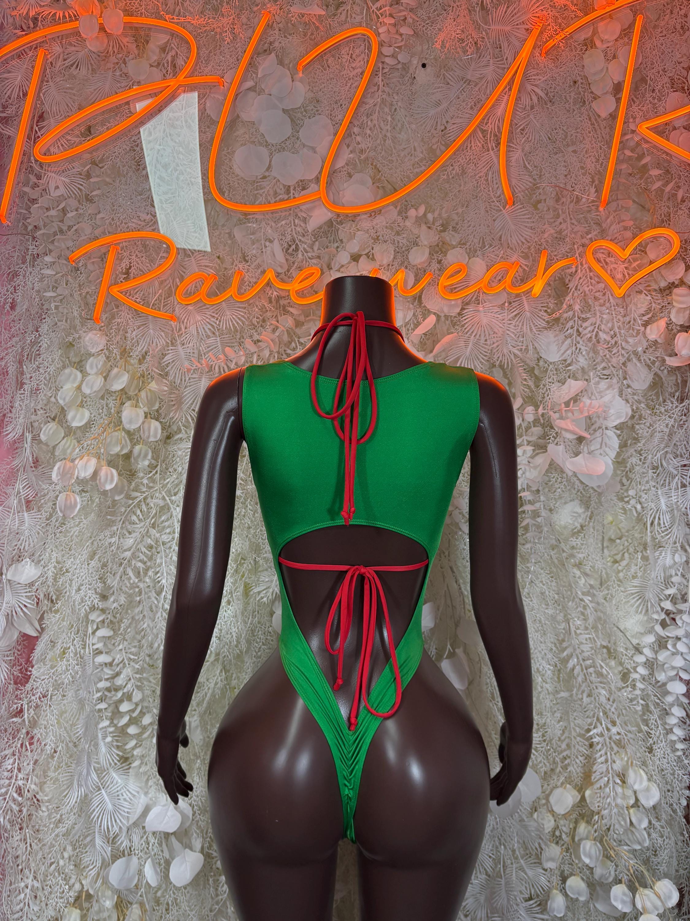 Green open-back bodysuit with tie lacing across the back and low-cut legs