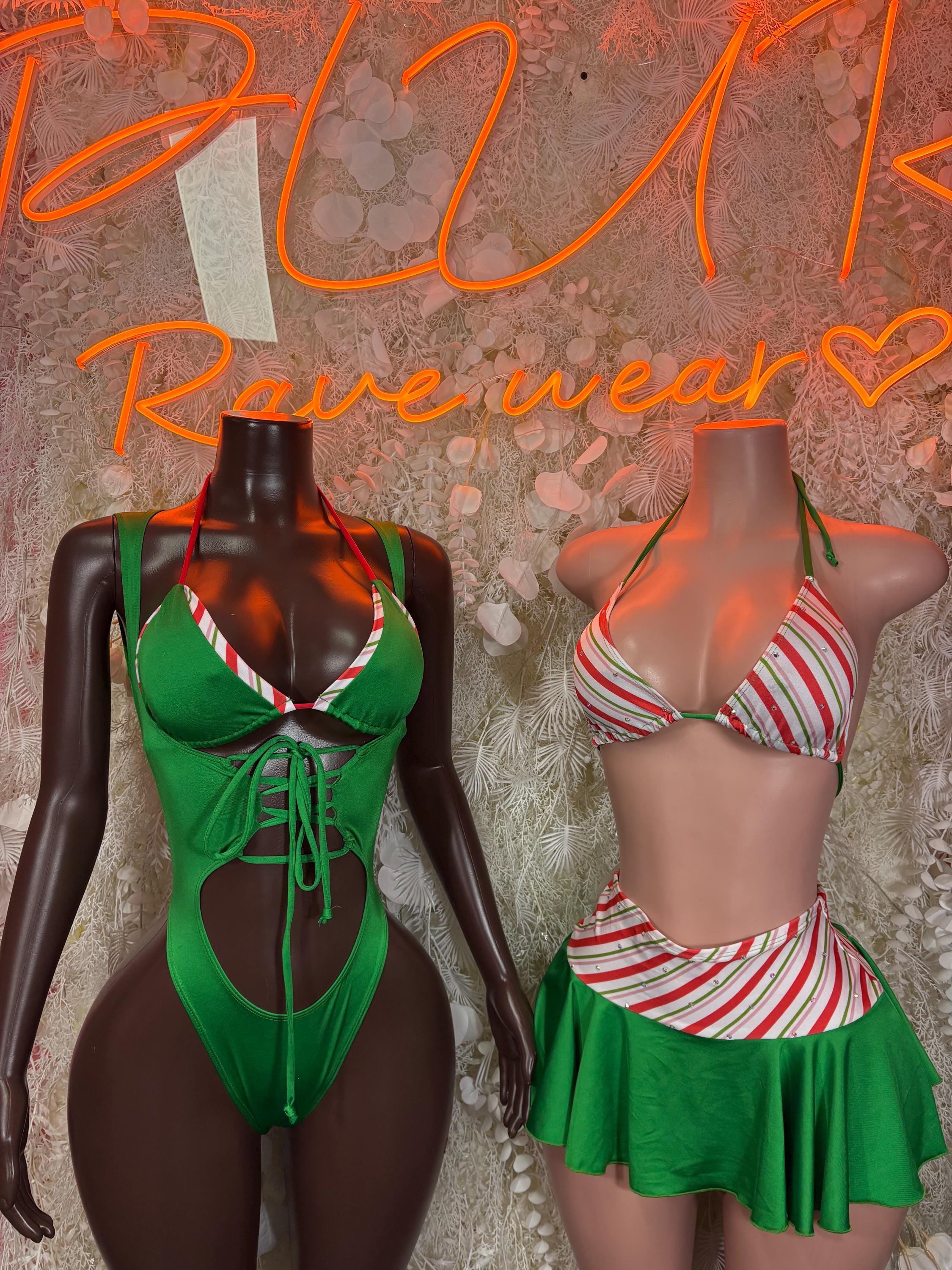 Two-piece festive costume set: green lace-up bodysuit and striped top with green skirt