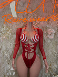 Red long-sleeve Santa-style bodysuit with white striped bra panel and lace-up front