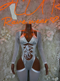 Silver metallic bodysuit with long sheer sleeves, front lace-up and thong cutout