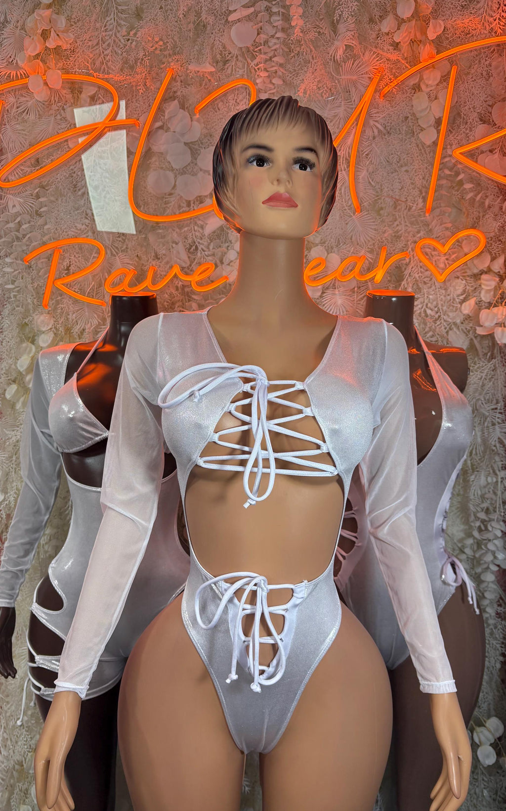 Silver metallic bodysuit with long sleeves and lace-up front cutouts