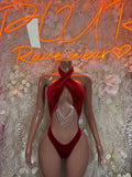 Red velvet rave bodysuit with halter neckline and twisted bow, open back, backless