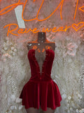 Red velvet one-piece dress with halter V-neck bodice and flared skirt