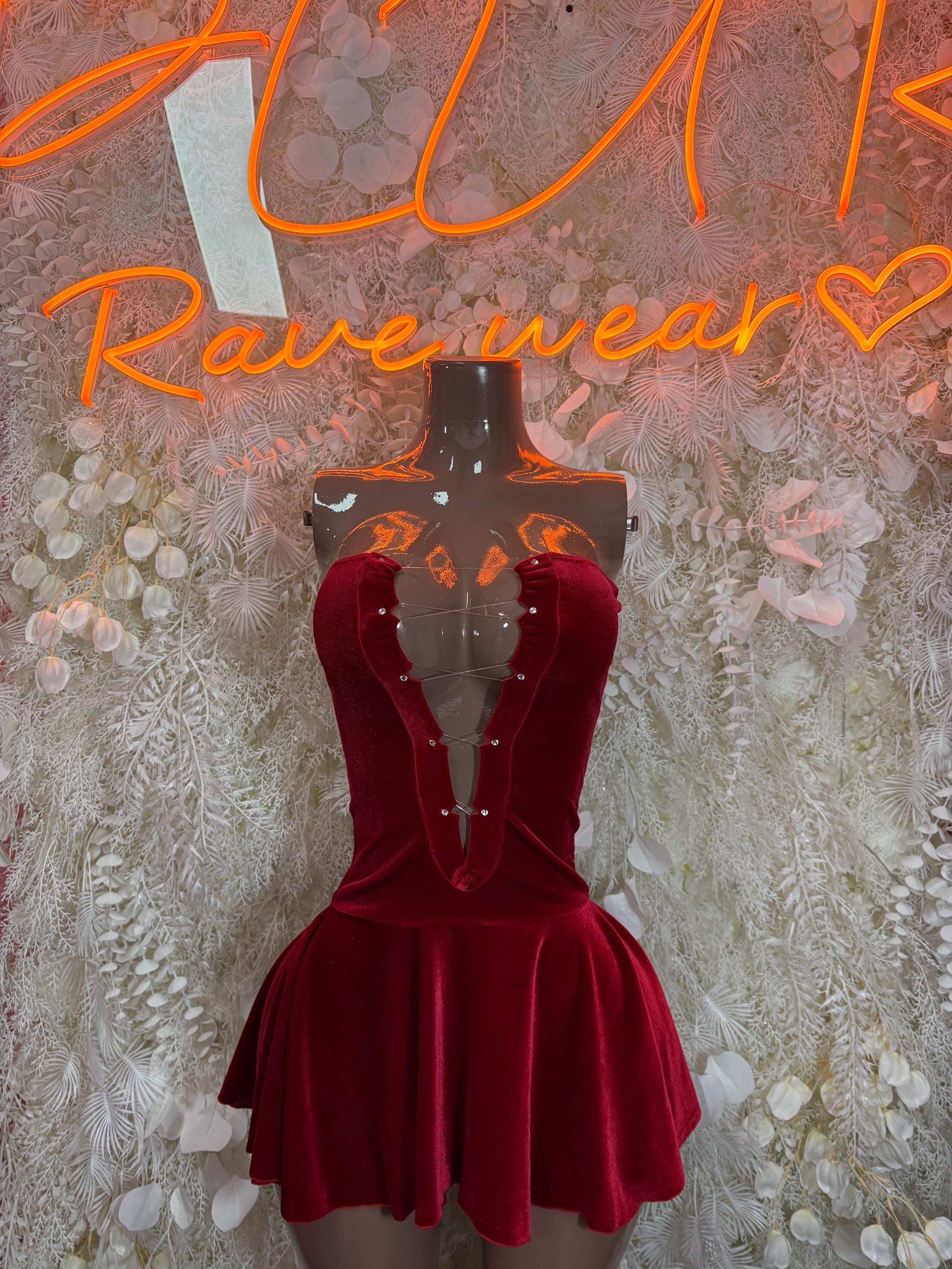 Red velvet one-piece dress with halter V-neck bodice and flared skirt