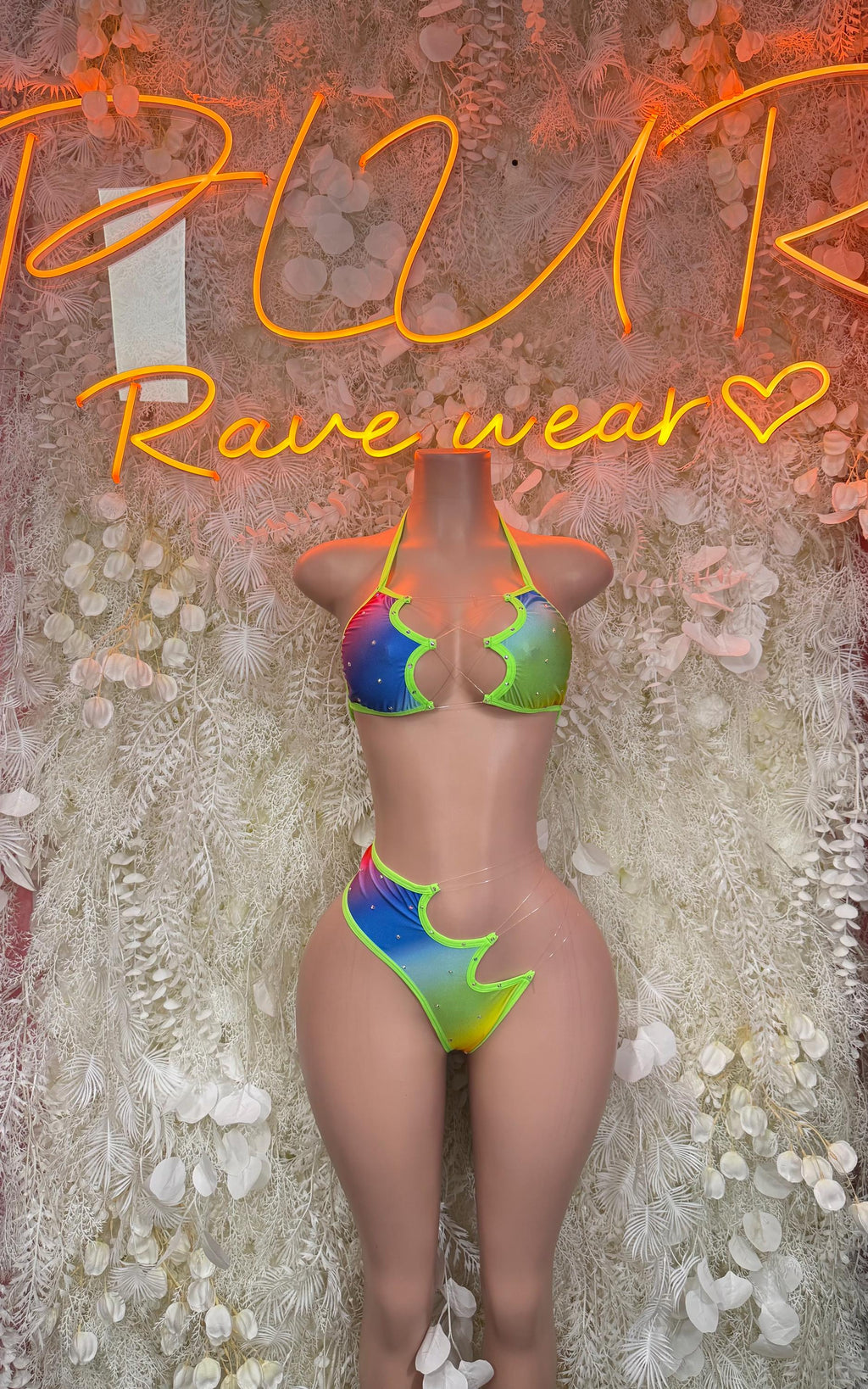 Multicolor rave bikini set with neon triangle top and high-cut bottoms, front view
