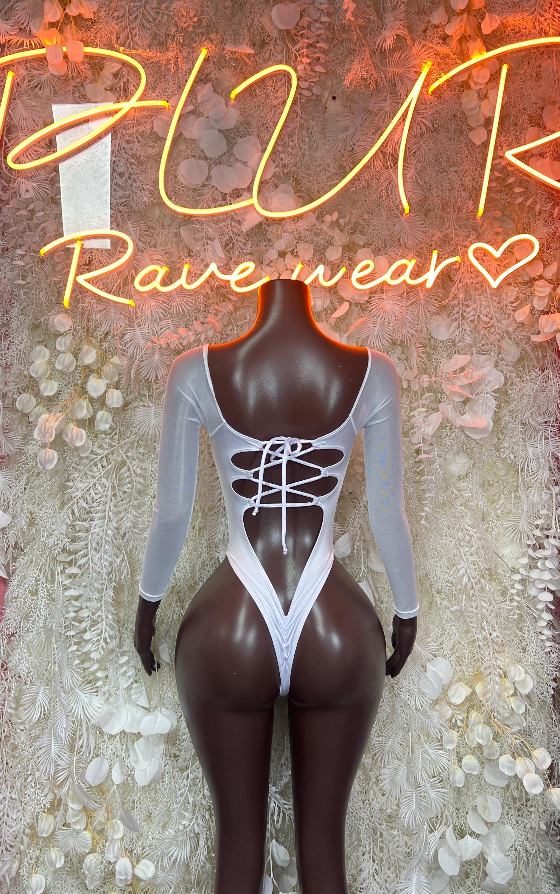 White long-sleeve bodysuit with lace-up corset front and cutout detailing