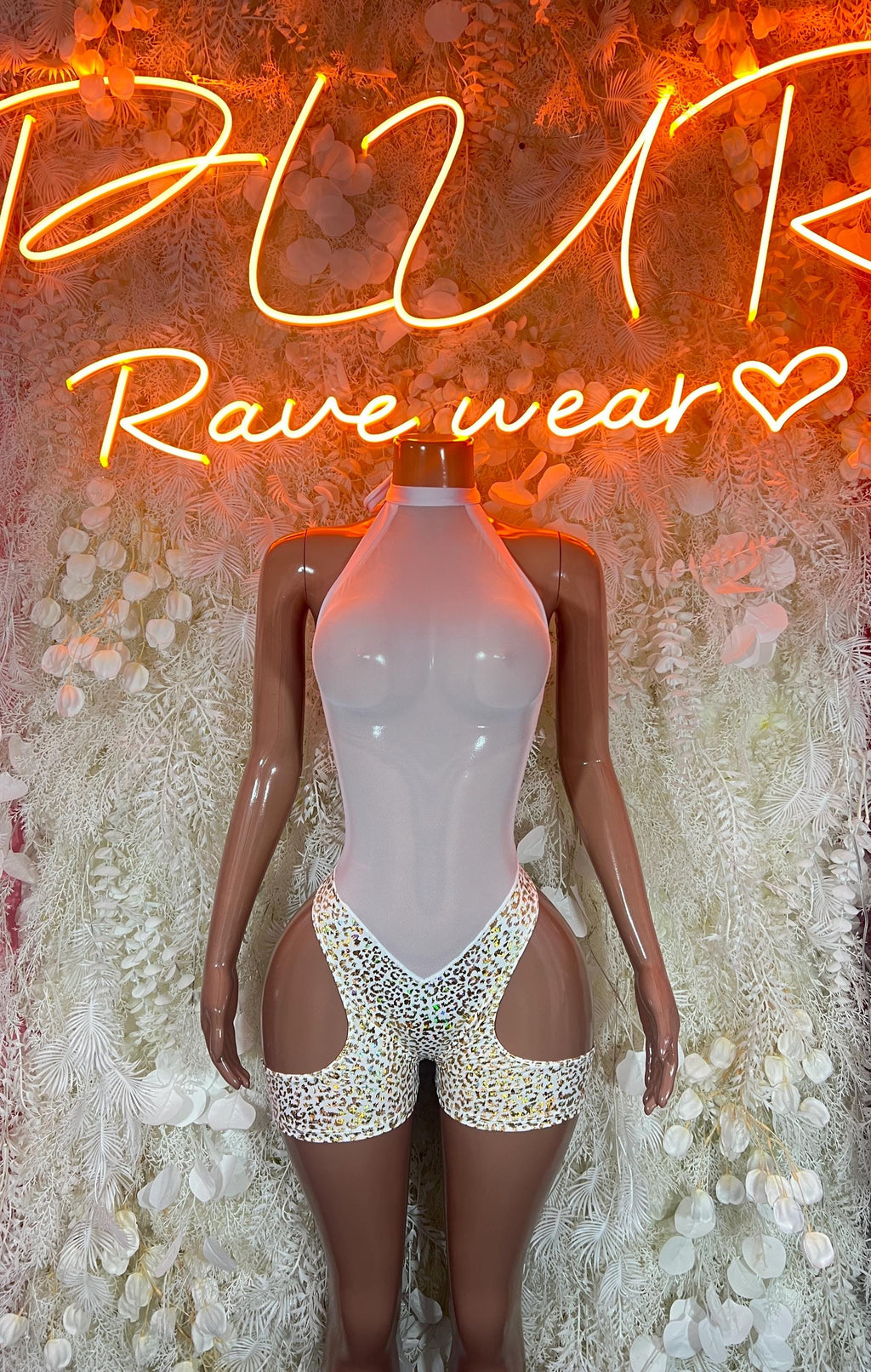 White cheetah-print rave bodysuit with high-cut legs and front cutout