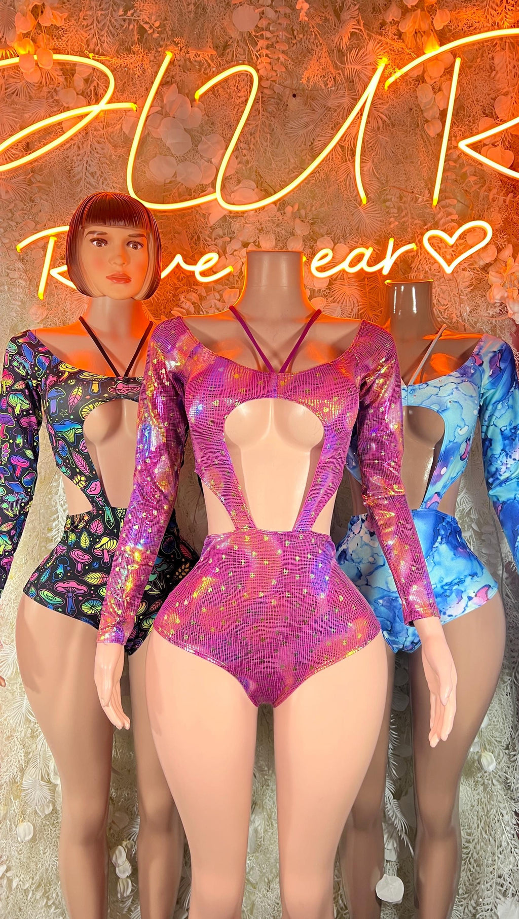 Long-sleeve one-piece bodysuit with scoop neck and abstract print on multiple models