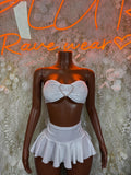 White bandeau top and ruffled mini skirt set, heart bow front