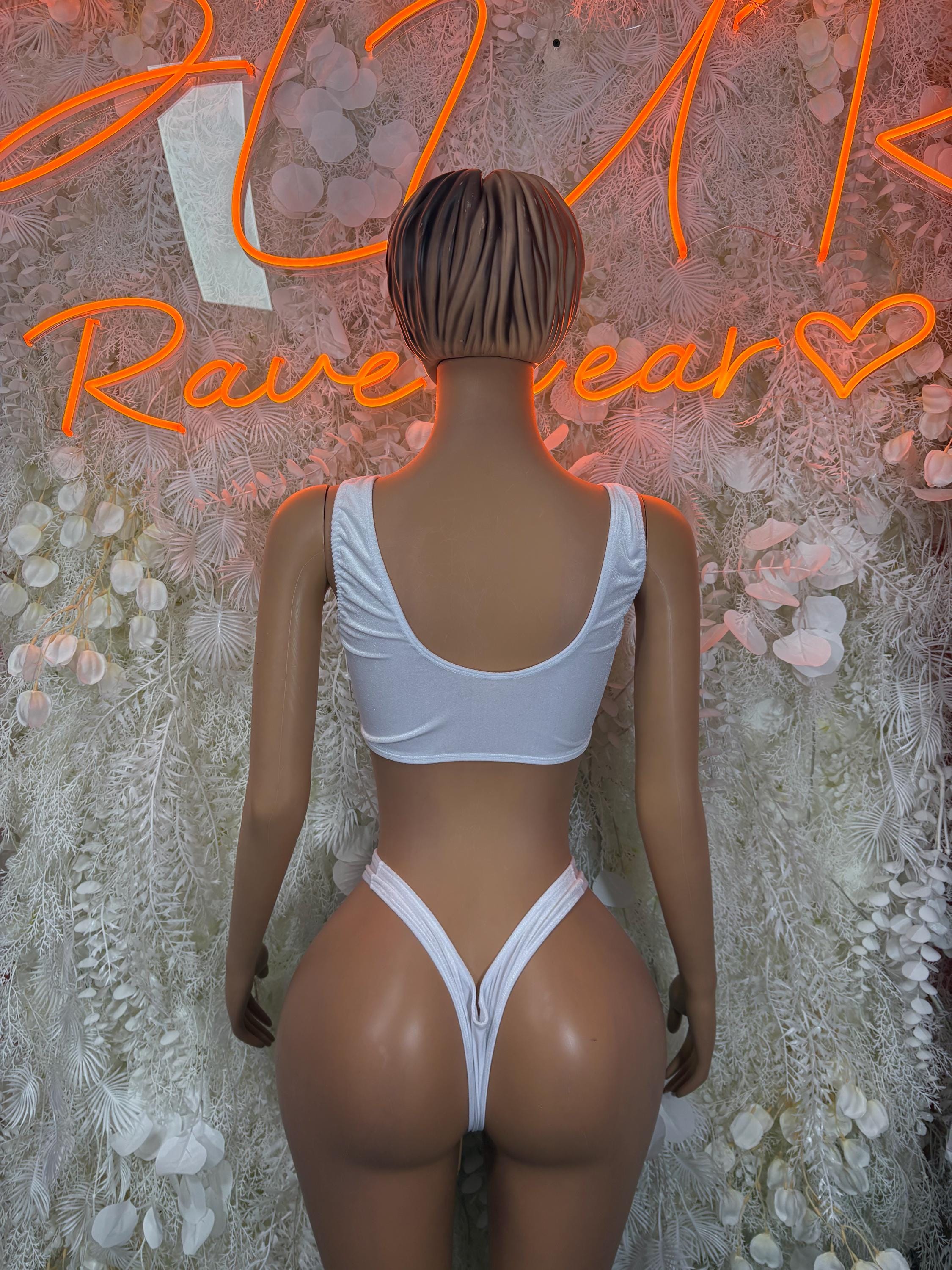 White two-piece skirt set: back view white crop top and high-cut bikini bottoms