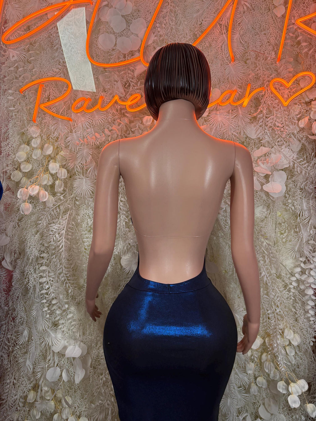 Blue metallic fitted backless gown with draped bodice