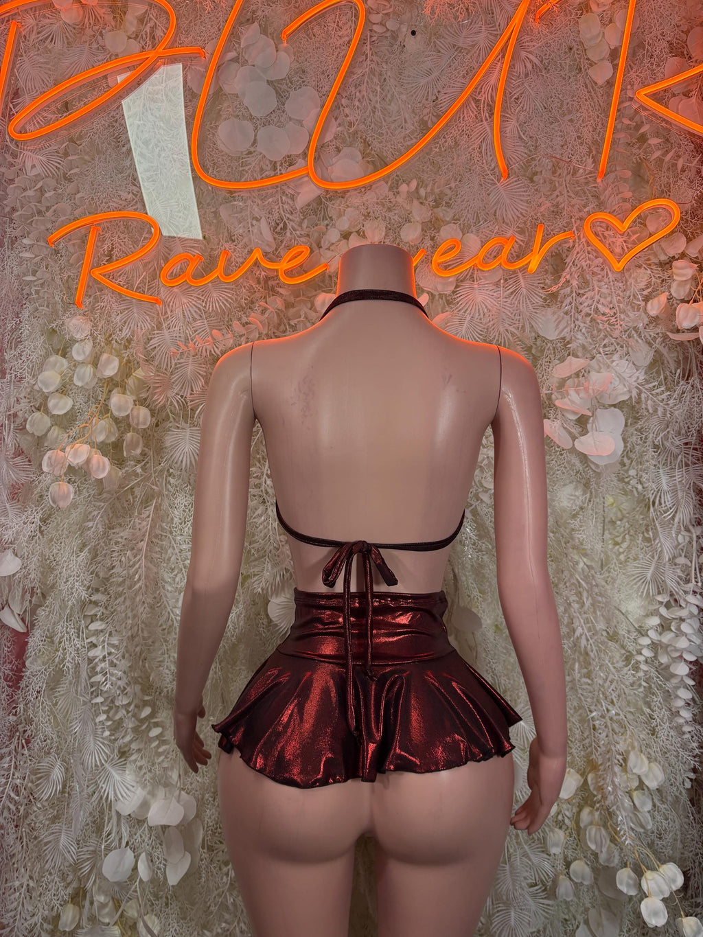 Backless metallic dark red halter top with tie straps and flared mini skirt