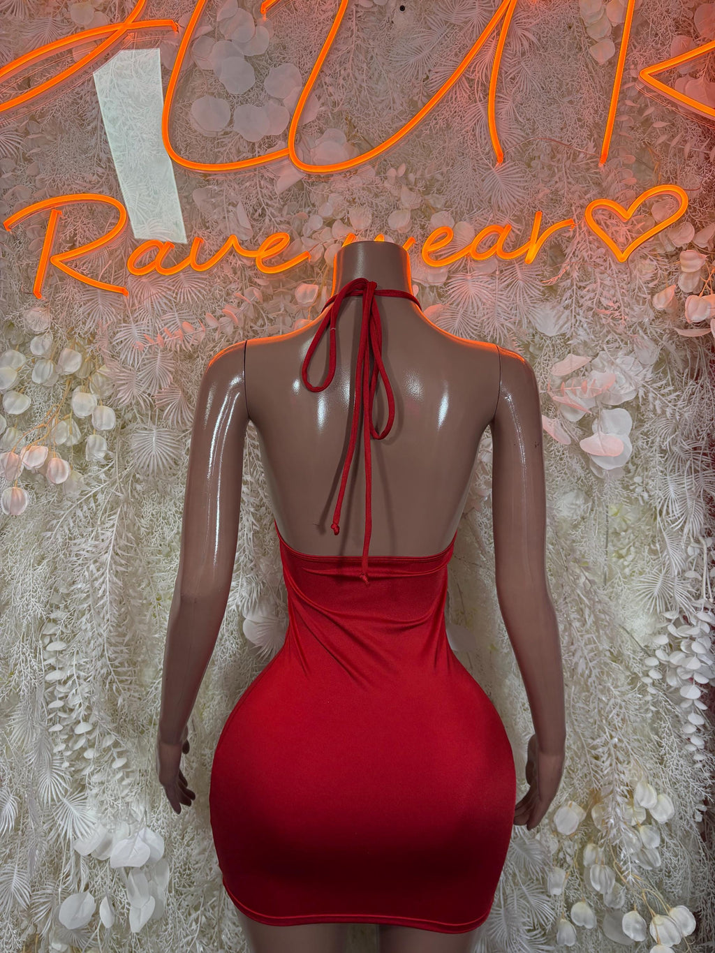 Red halter mini dress with open back and tie strings at the neck