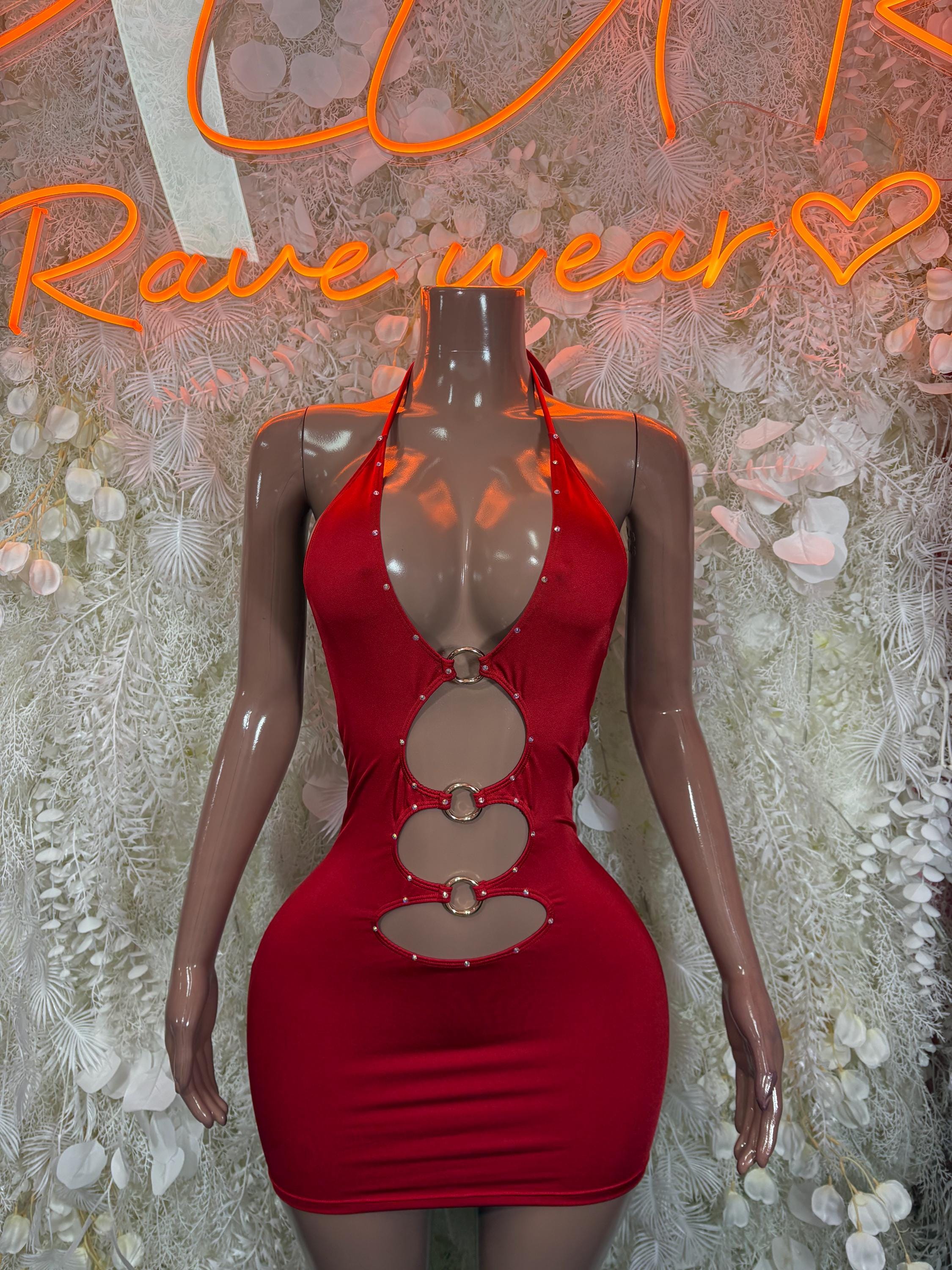 Red halter mini dress with circular ring cutouts down the chest and waist