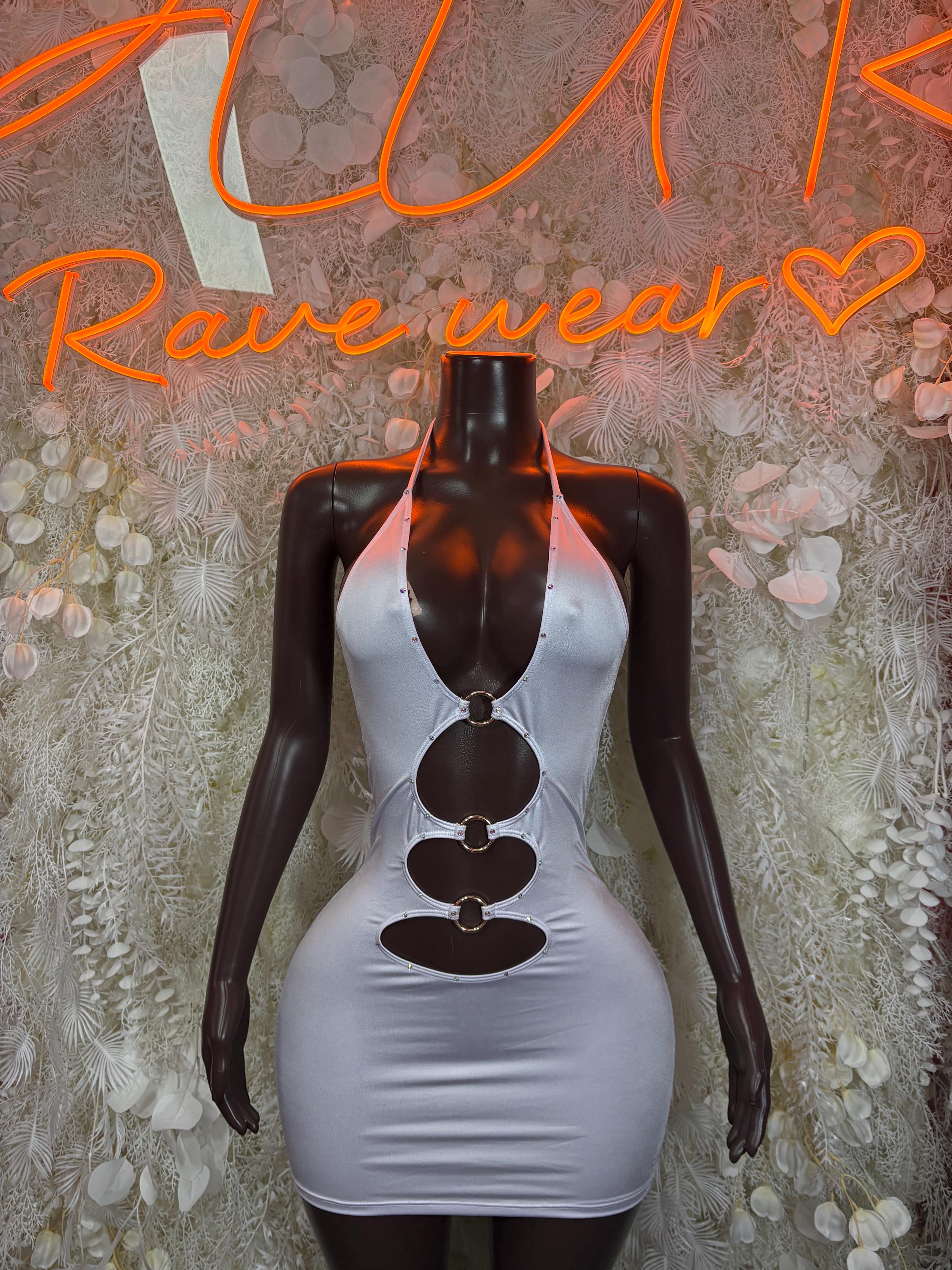 White mini club dress on mannequin, halter neckline with oval cutouts along bodice
