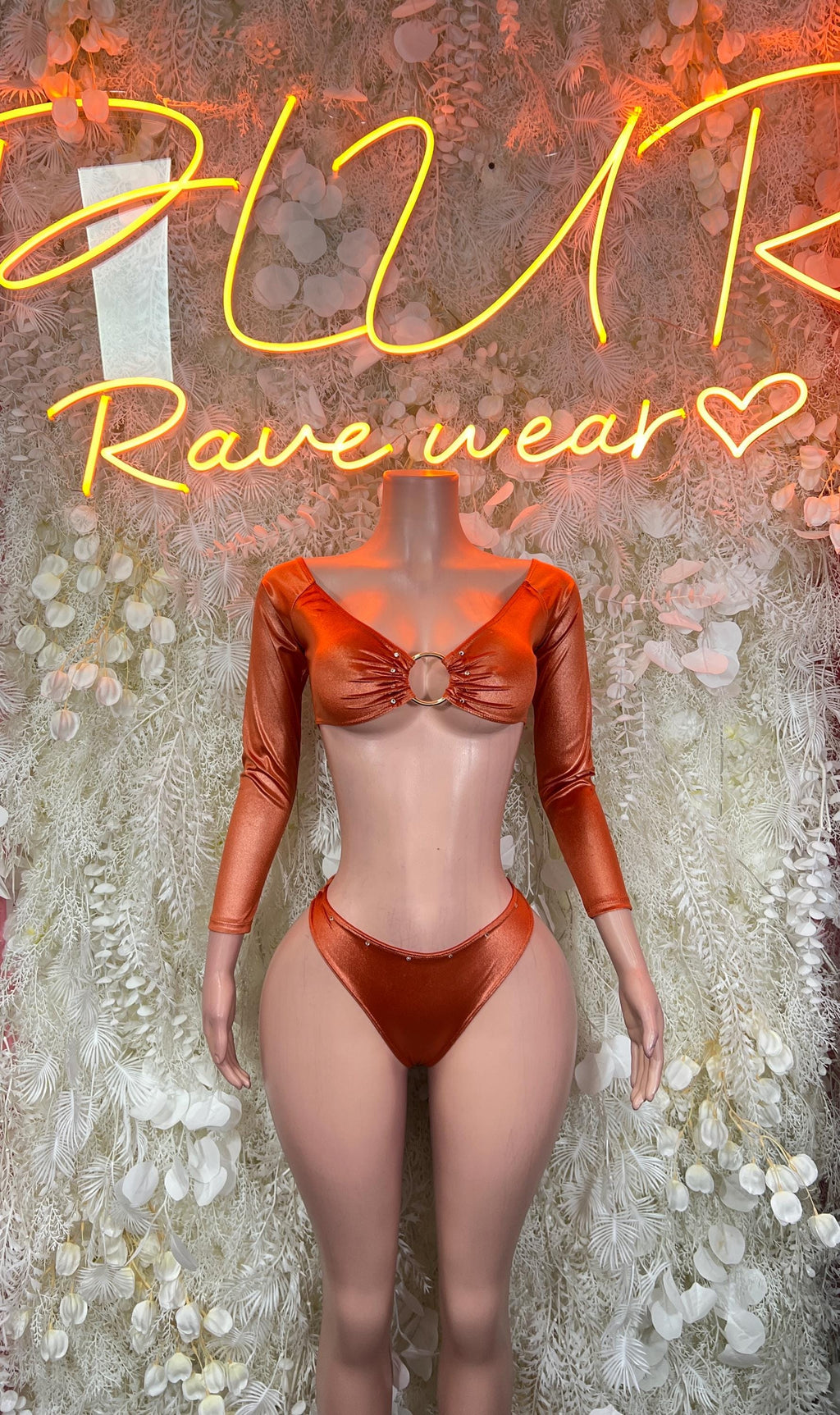 Metallic orange long-sleeve crop top and high-cut thong bikini set