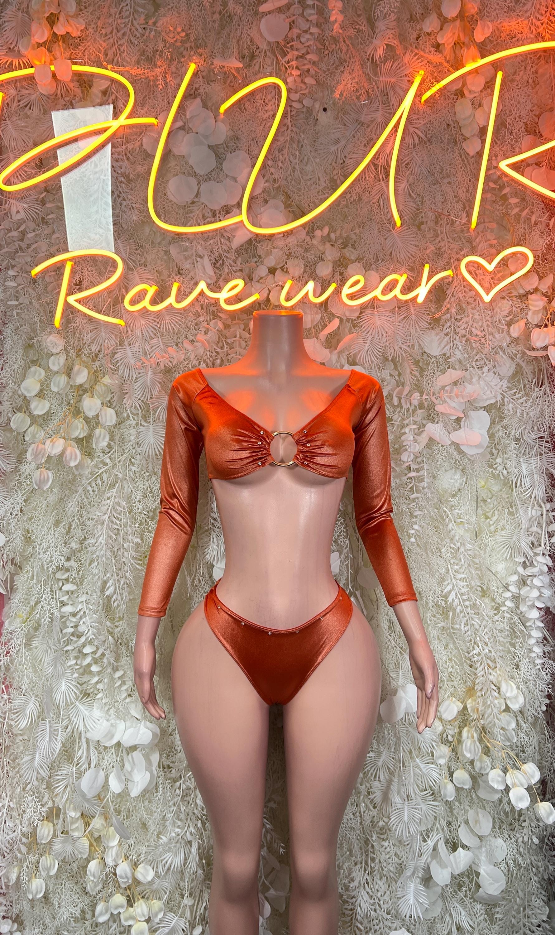 Metallic orange long-sleeve crop top and high-cut thong bikini set