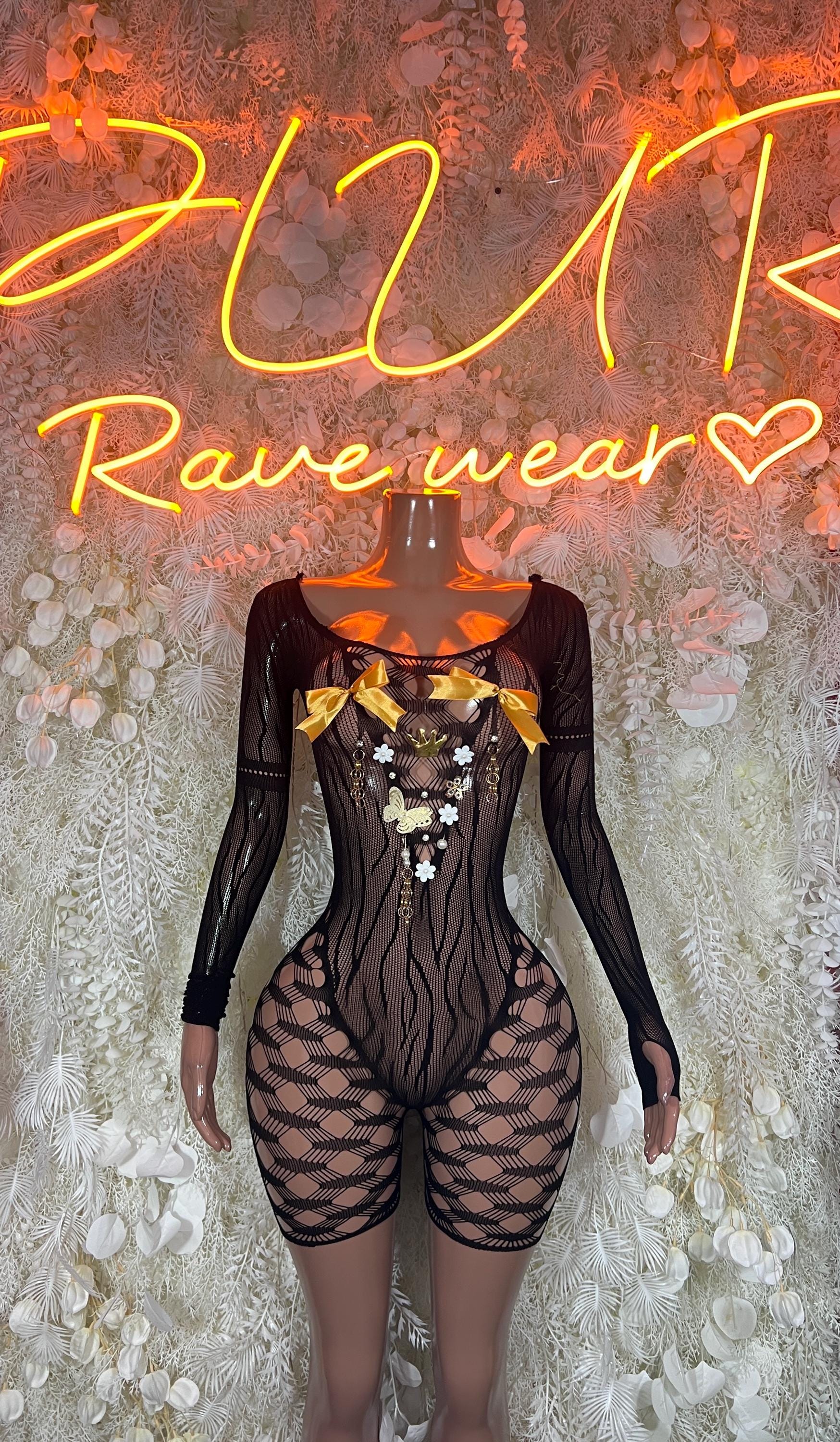 Black fishnet long-sleeve bodysuit with sheer panels and high-cut shorts