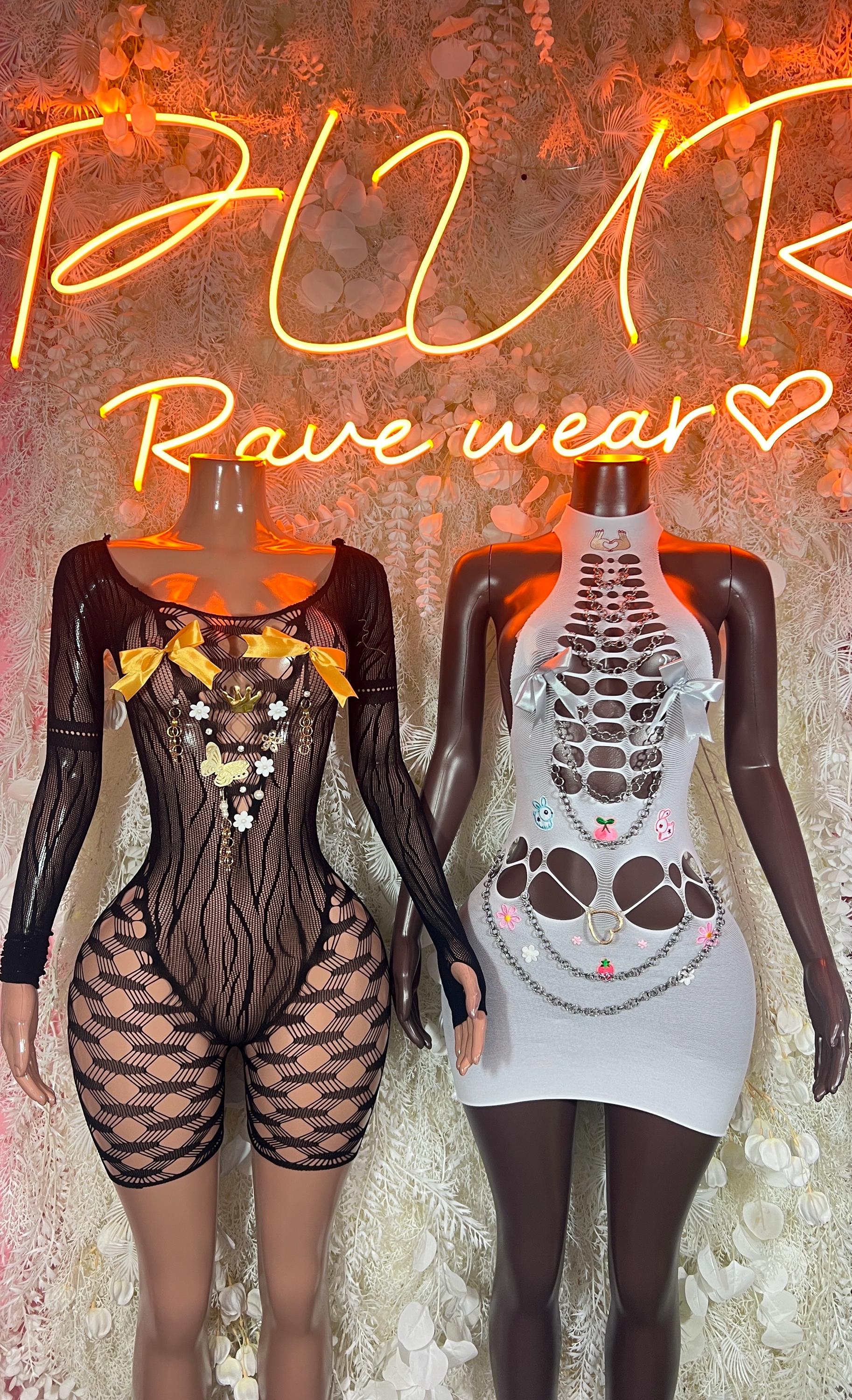 White fishnet bodysuit with lattice chest and matching short skirt, side view