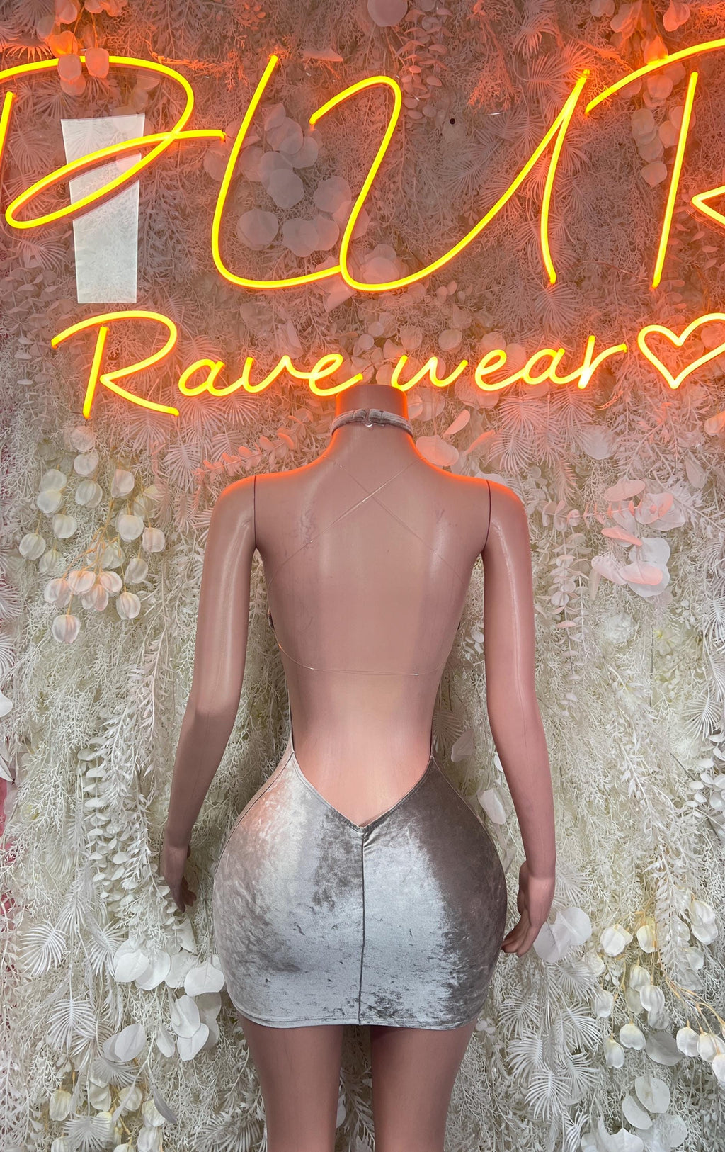 Silver velvet mini dress with open back, sleeveless, fitted.