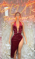 Burgundy velvet halter party dress with deep V front, ruched bodice and thigh slit