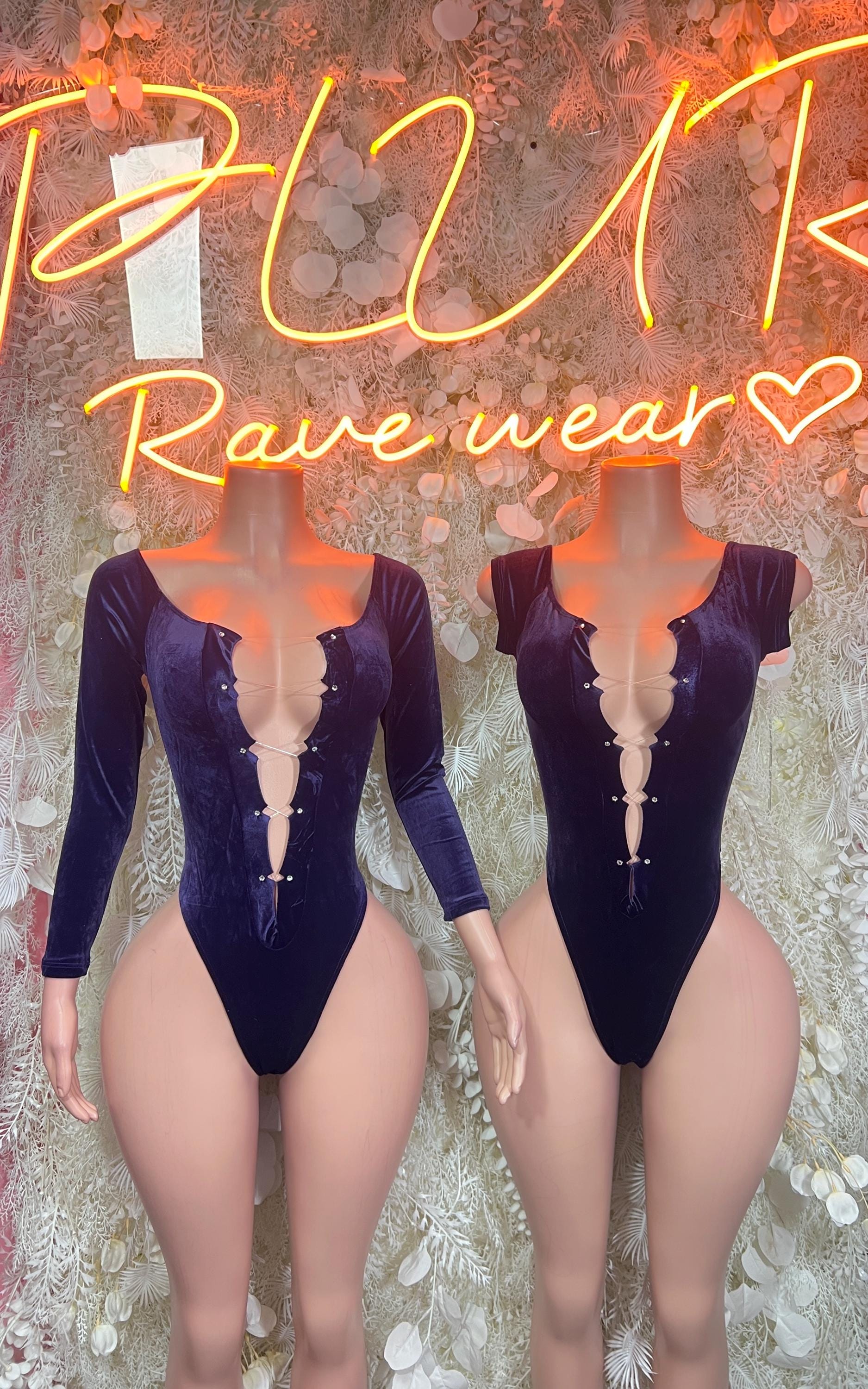 Two dark blue velvet bodysuits with long sleeves and deep V neckline, buttoned front