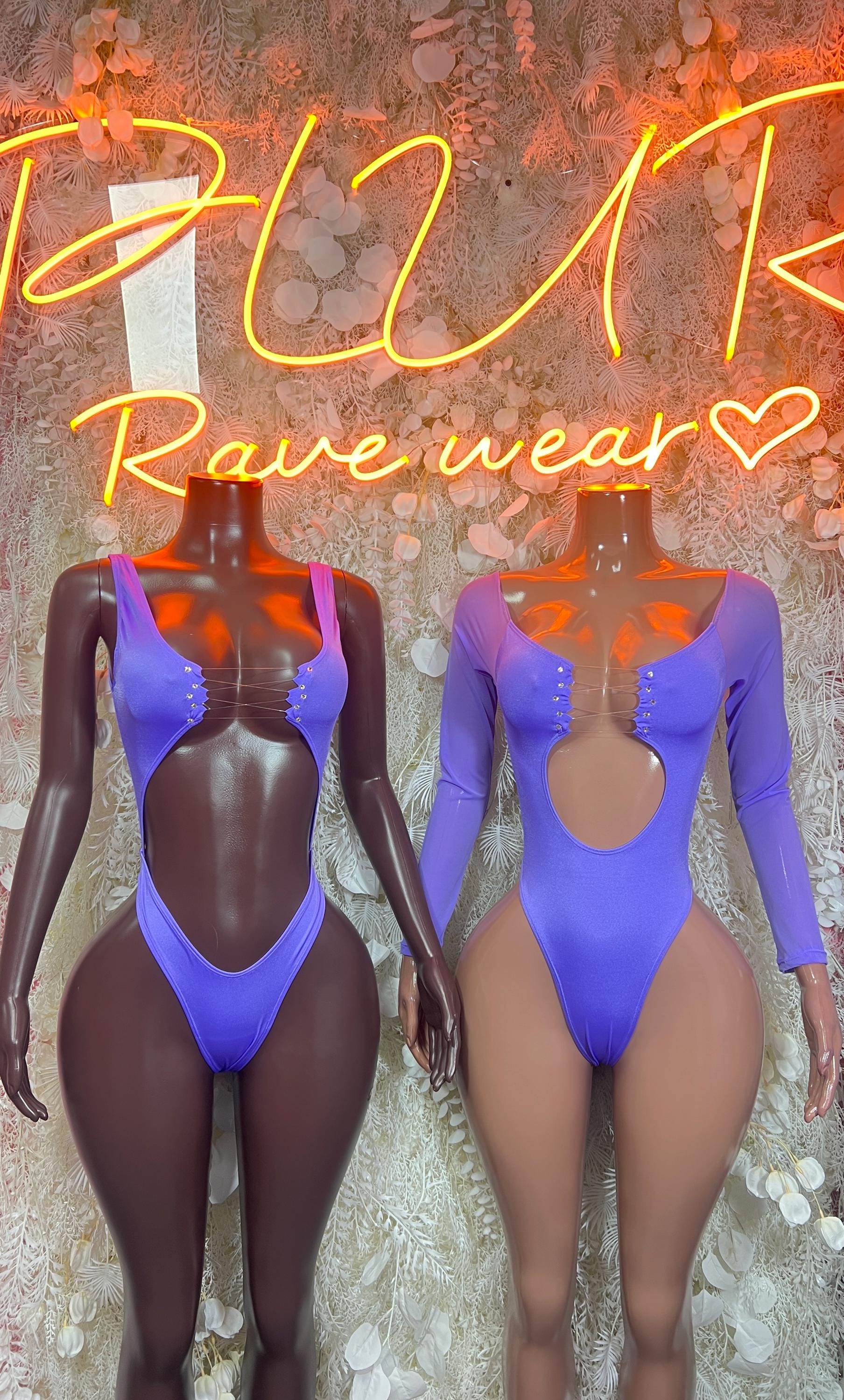 Purple long-sleeve bodysuit worn by two dancers, scoop neck and high-cut bottom