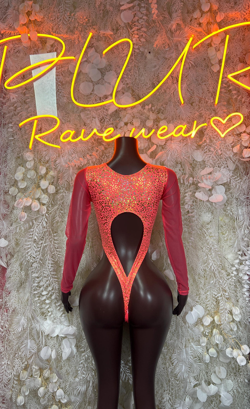 Coral cheetah-print hologram bodysuit with long sleeves and oval chest cutout