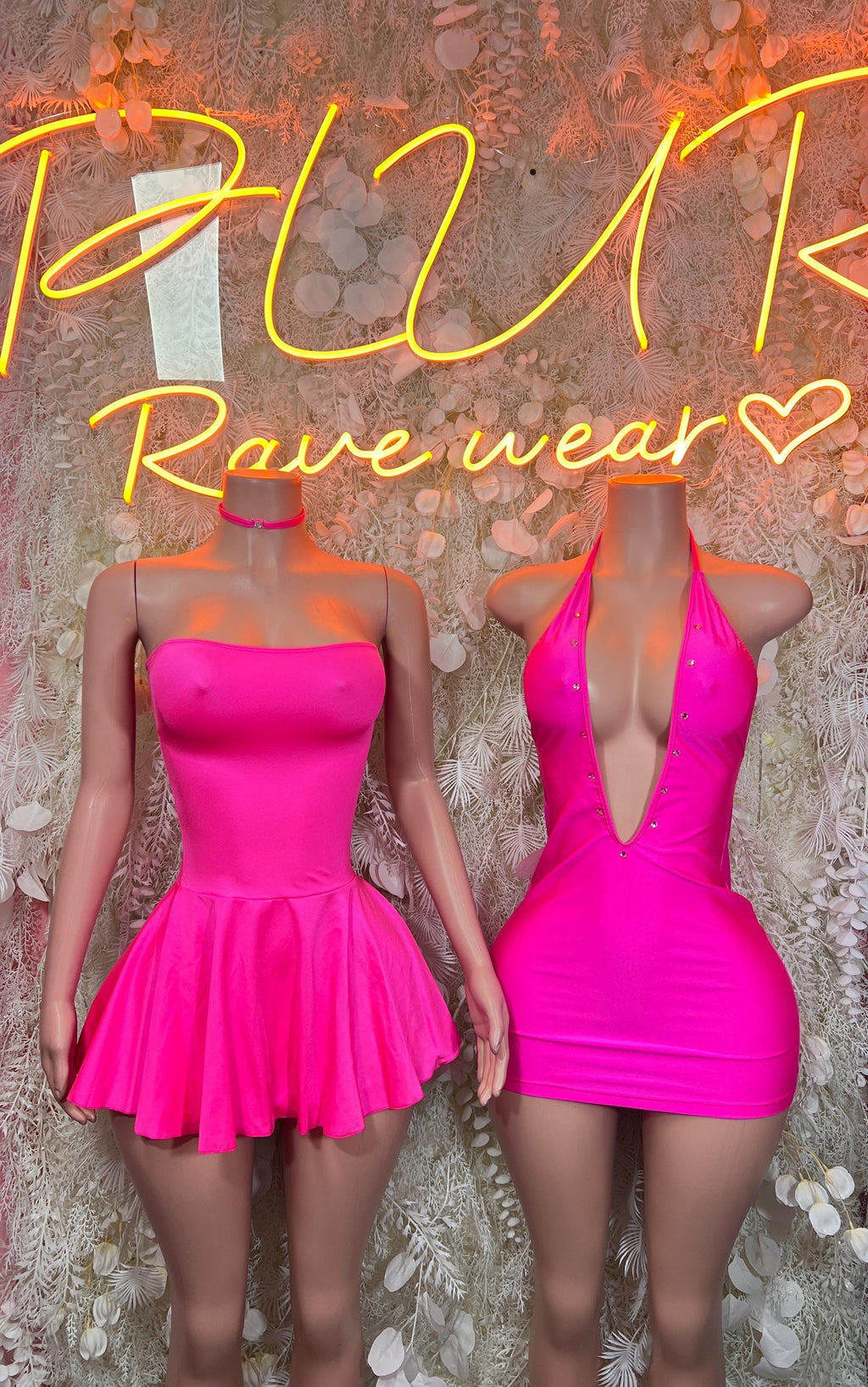 Bright pink strapless mini dance dress with ruched bodice, flared skirt, and low back