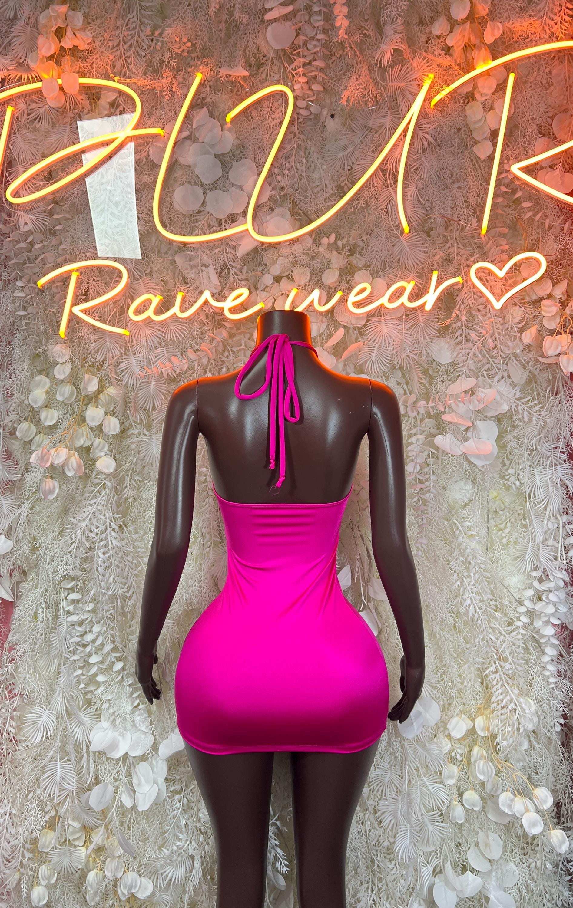 Pink halter mini dress with vertical strap detail at center back