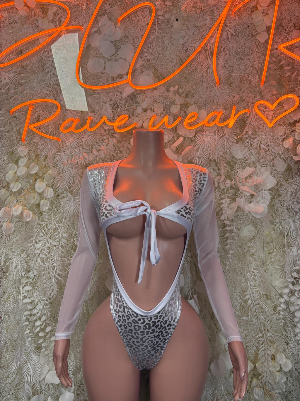 Metallic silver cheetah-print bodysuit with long sleeves, lace-front and open back