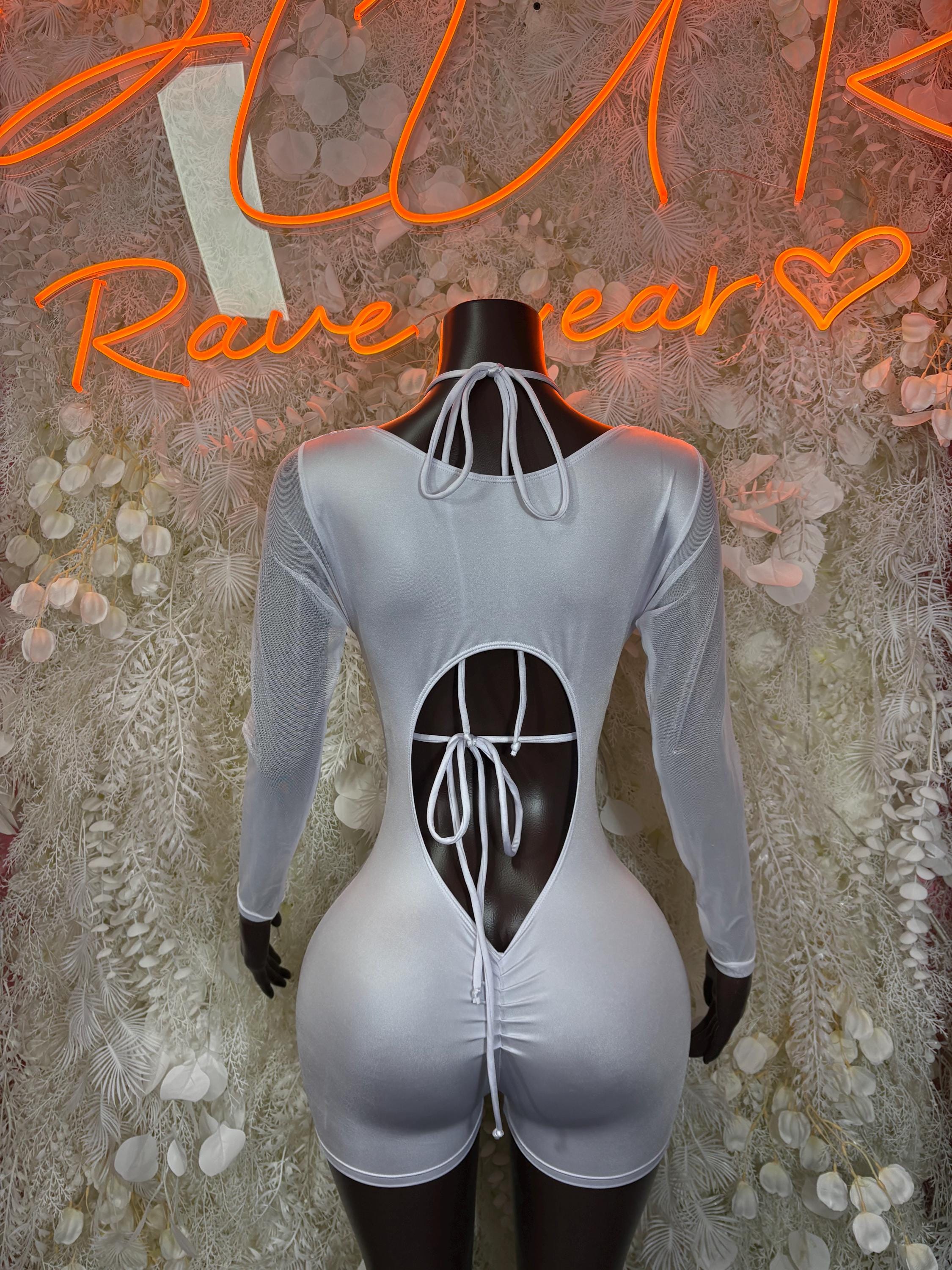 Cheetah print bodysuit with open back cutout, silver-gray with black spots, long sleeves