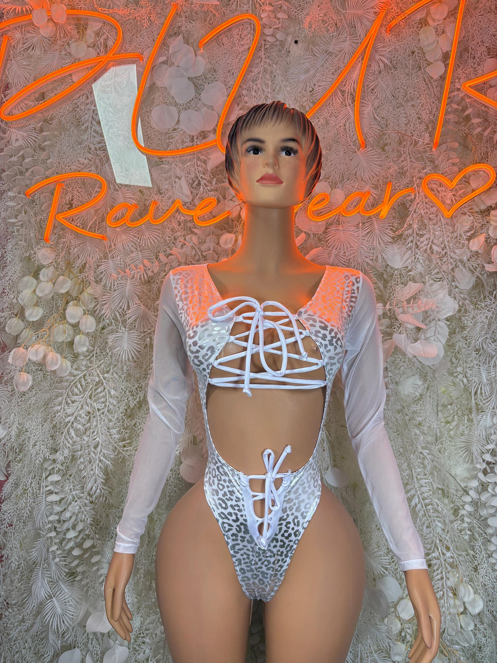 Hologram silver cheetah print bodysuit with long sleeves and lace-up front straps