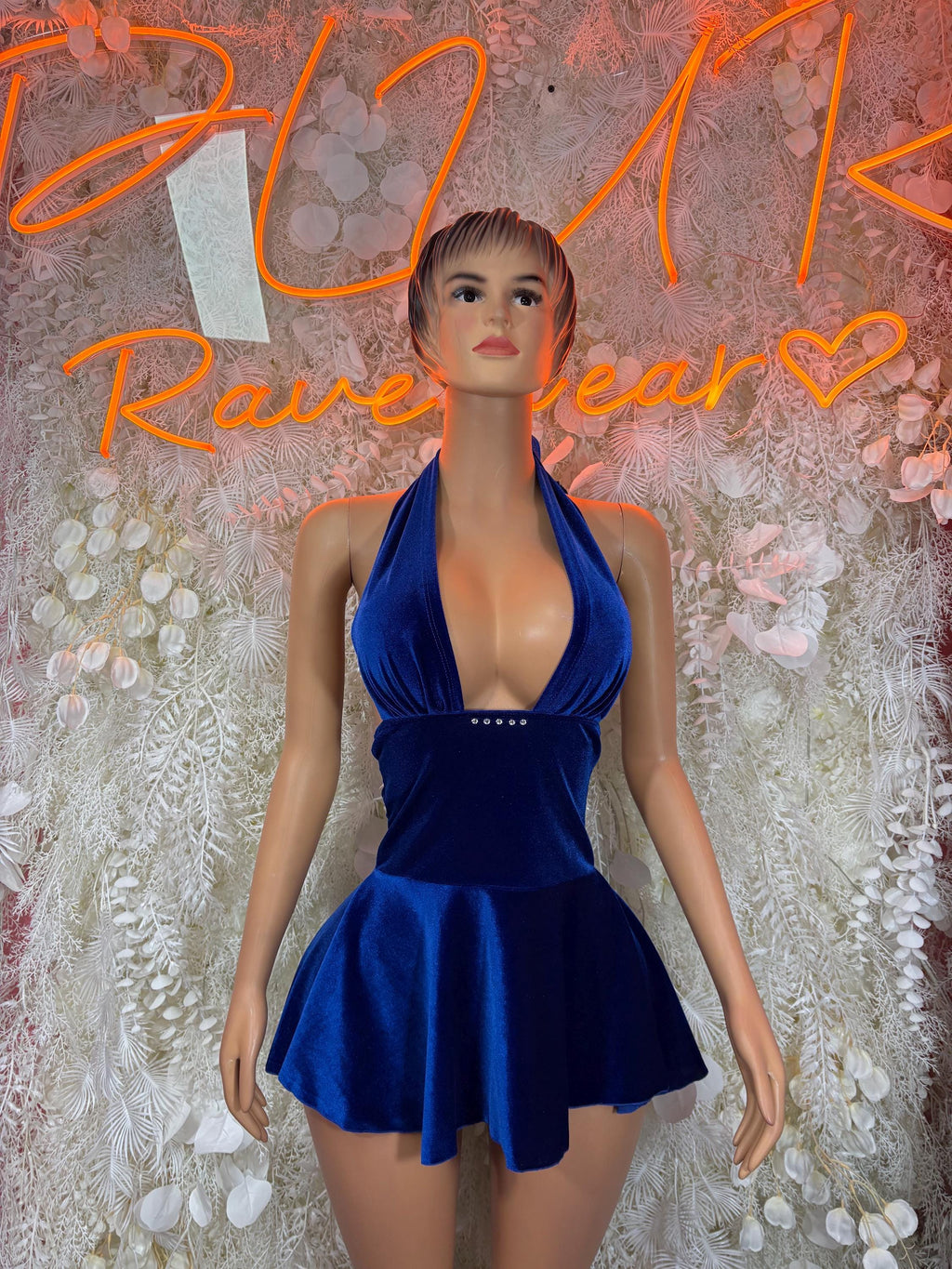 Blue velvet halter mini dress with deep V neckline, fitted bodice, tiered skirt