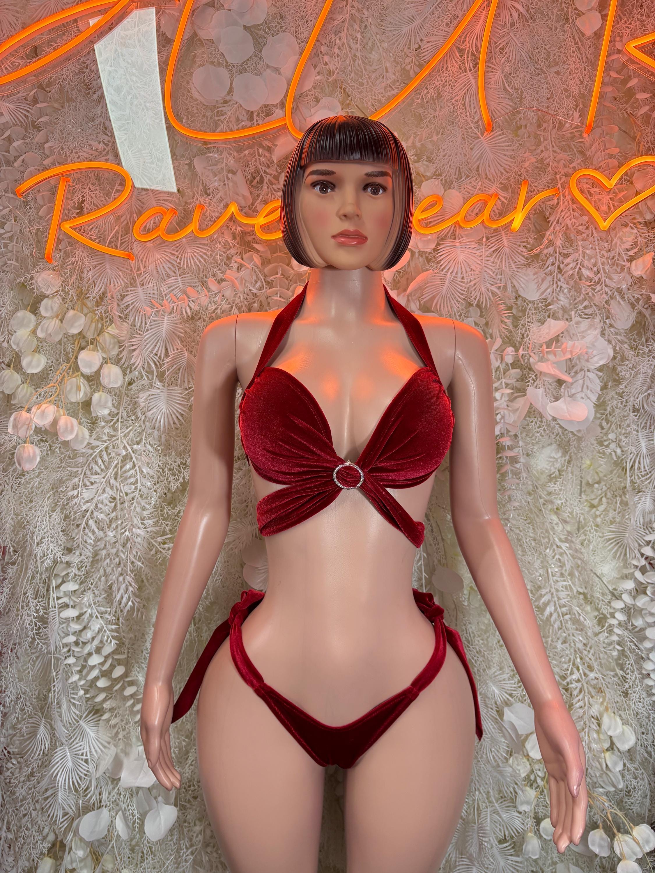 Red velvet halter bra and matching thong-style bikini bottoms set