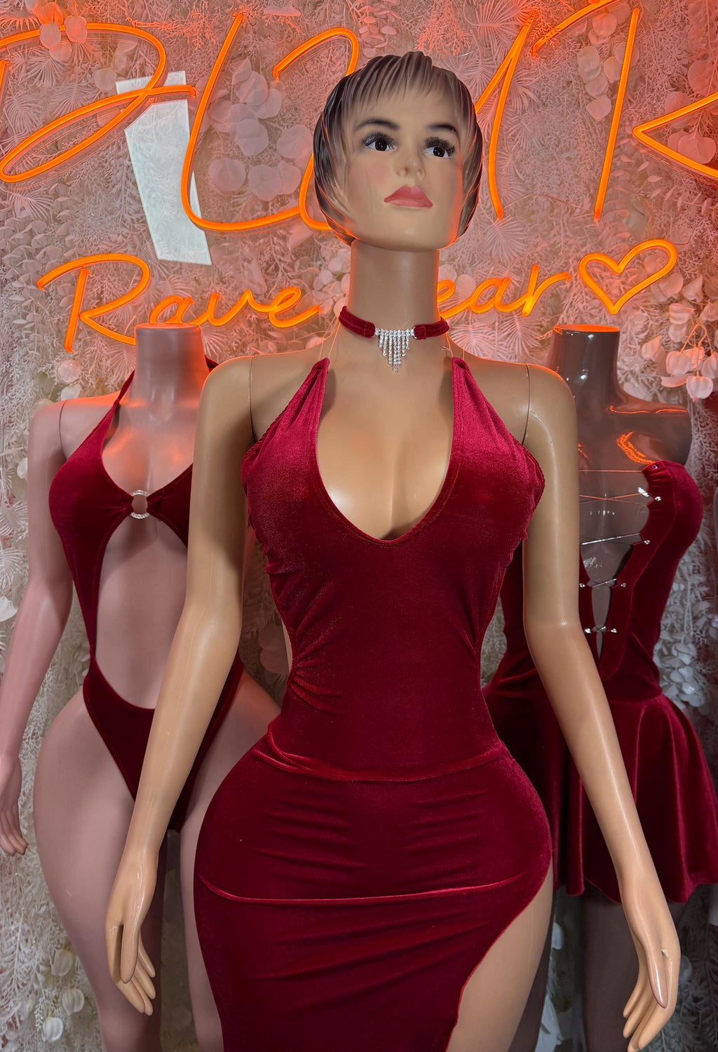 Red velvet rave bodysuit with halter straps, V neckline and high-cut leg openings