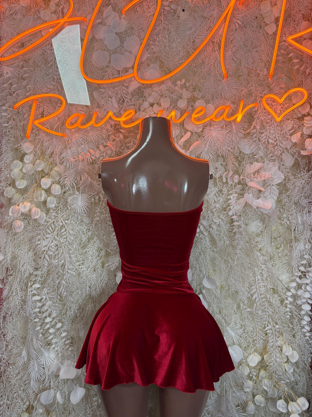 Red velvet one-piece dress with halter V-neck bodice and flared skirt