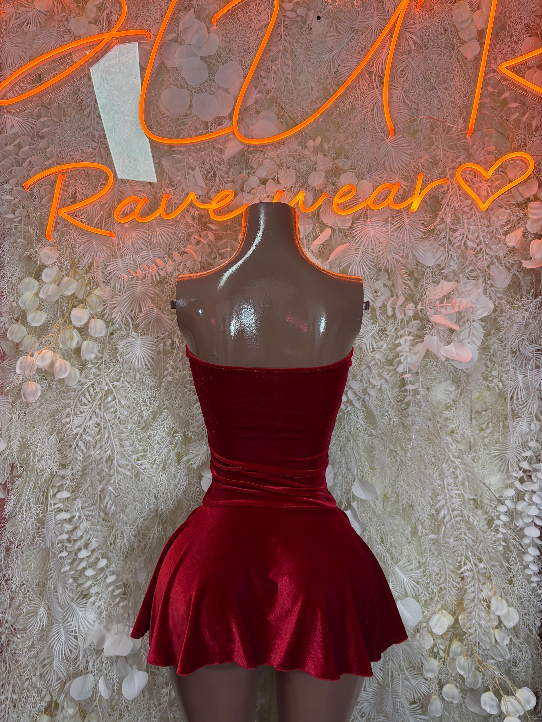 Red velvet one-piece dress with halter V-neck bodice and flared skirt