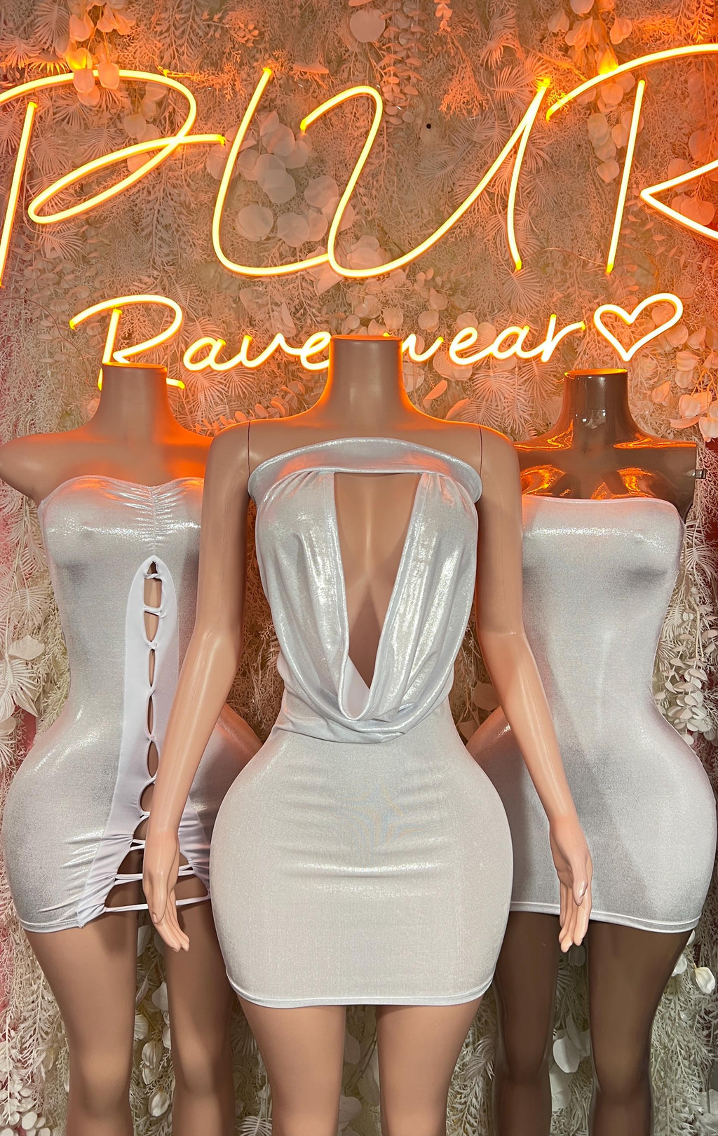 Silver holographic mini dress with deep V open back and sleeveless ruched bodice