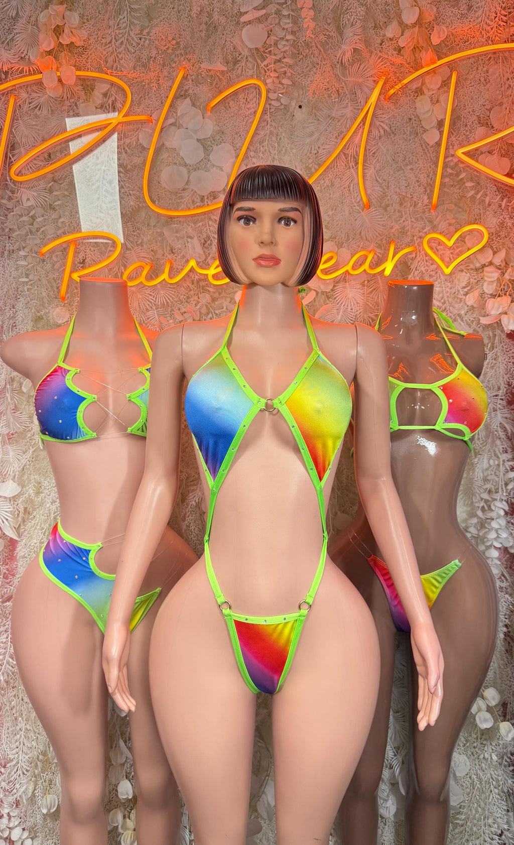 Halter-style multicolor bodysuit with neon green trim and rainbow center cutout